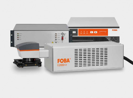 Ultra-short pulse laser marking system with laser control unit and supply unit.